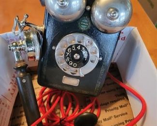 57.	    Antique Wall Rotary Phone		$225