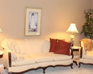 Custom upholstered furniture with lots of nice home decorations.  