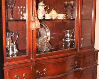 Mahogany china cabinet. We also have a mahogany buffet/server, table and six chairs.
