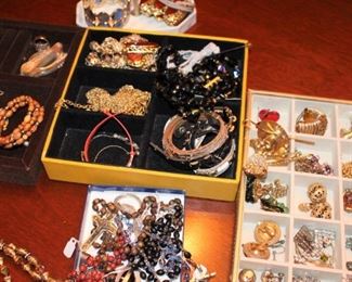 Costume jewelry and rosaries.