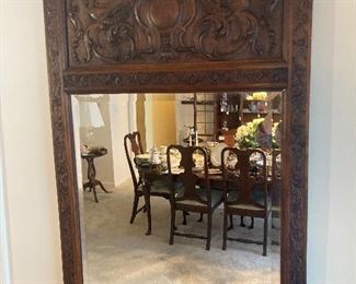 Mahogany or Teak mirror with a beveled glass