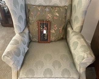 One of two wing chairs with like-new upholstery