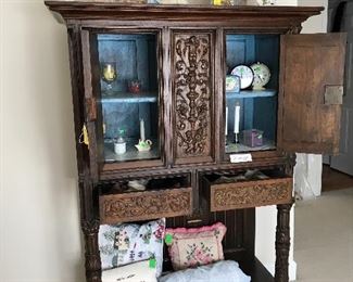 Ornate carved cabinet 