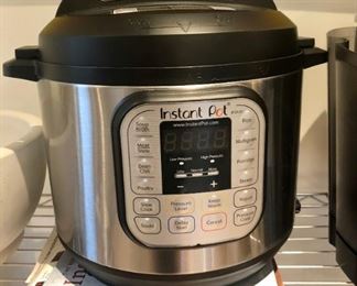 Instant Pot with cookbooks