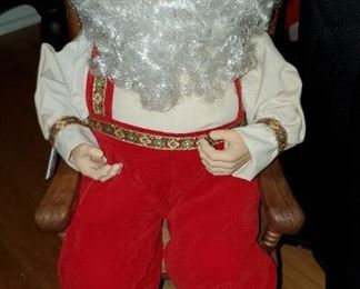 Electronic Santa in rocking chair 