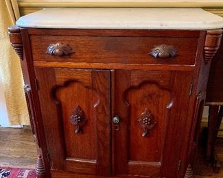 Mid to Late 19th Century American Carved Walnut washstand.