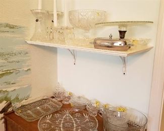 Cut Glass Glassware on top shelf, 1940's - 1970's glassware on table top.