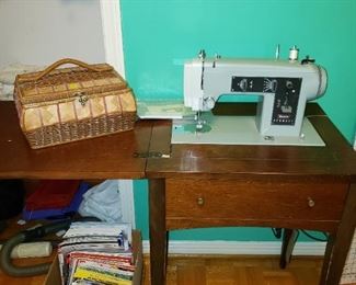 Kenmore Sewing Machine in Wood Cabinet, Sewing Box is sold separately.