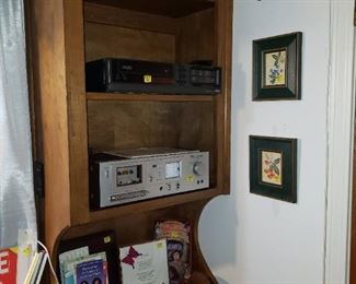 Stereo equipment (on shelves).