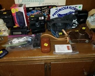 Vintage Cameras and miscellaneous office supplies.