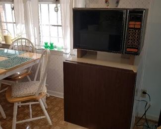 Large microwave on top and Freezer on bottom - these pieces are sold separately.