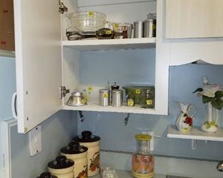Great canister set and vintage pieces in cabinet - this counter is now filled with new finds!
