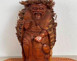 Asian Happy Fisherman in Wood