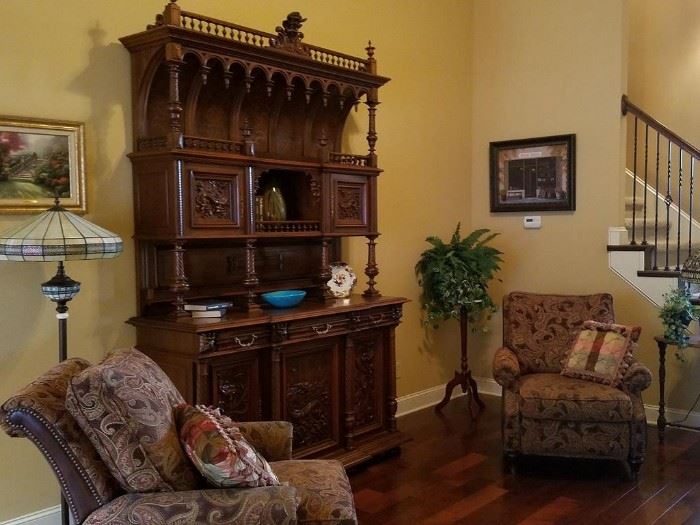 Two matching cloth/leather recliners and antique walnut hutch