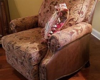 One of two matching cloth/leather recliners by Bassett