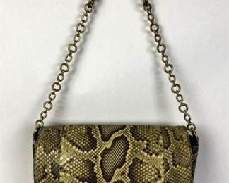 5	Dolce and Gabbana Blonde Python Handbag	Dolce and Gabbana blonde python flap handbag, double magnetic closures, gold tone hardware, python and gold tone chain link shoulder strap, black satin lining with one zippered interior pocket, includes dust bag, some minor wear from use, good condition, 7"H, 12"W, 4"D
