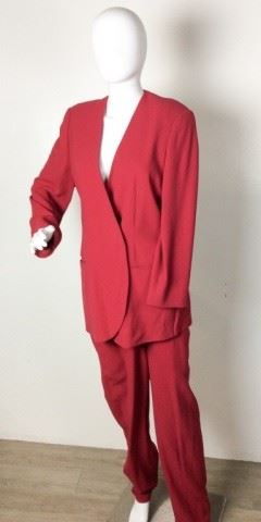 19	Giorgio Armani / Bergdorf Goodman Red Pant Suit	Giorgio Armani Italy / Bergdorf Goodman on the Plaze New York Vestimenta Spa Wool Red Pant Suit Red Lining Size 40 Condition - Spot on right leg - Pull left sleeve
