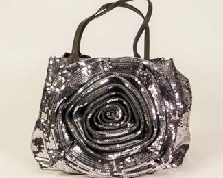 33	Valentino Grey Silver Sequin Petale Handbag	Valentino Garavani grey handbag, sequin exterior has classic petale flower design with dark grey leather shoulder straps, silver tone hardware, satin lined interior, two open and one zippered interior pocket, removable grey leather shoulder strap, good condition, 10"H, 12"W, 5 1/2"D.
