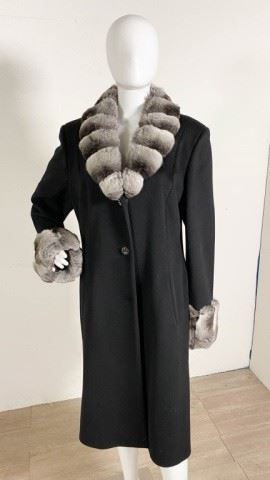 40	Black St. John Coat with Chinchilla Trim	Lot includes St. John black cashmere coat with natural chinchilla shawl collar and cuffs, size 14, 18"W at shoulders, 43"L, good condition
