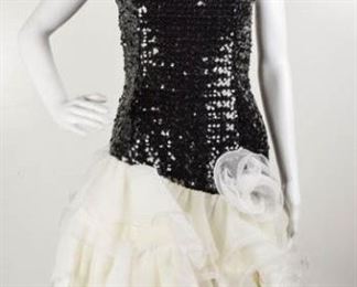63	Strictly Swift Cocktail / Party Sequin Dress	Strictly Swift Cocktail / Party Black Sequin Dress Skirt Portion is Layers of Organza with Large Organza Flower Size Medium - 100% Polyester
