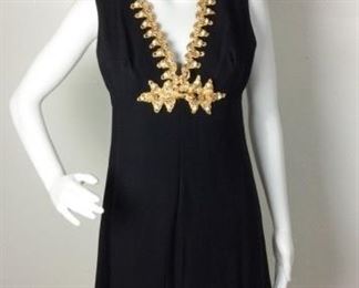 64	Vintage Lord & Taylor Cocktail Dress	Vintage Lord & Taylor Black Ornate Cocktail Dress Golden Cording - Pearl-like Beads & Rhinestones patterning decorate the collar & front of dress back zipper closure Condition - Some Damage to front embellishment - see photos SIZE 7-8

