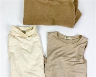 80	Grouping of Hermes Tops	Lot includes tan long sleeve Hermes top, some minor marks, size 40, 93% silk, 7% elastane, dry clean only, 16" at shoulders, 21 1/2L, some marks from wear, good condition; ecru Hermes turtleneck, size 42, 93%silk, 7% elasthane, 18" at shoulders, 22"L, some marks from wear, fair condition; Hermes cashmere sweater, tag still attached, 22 1/2"L, excellent condition.

