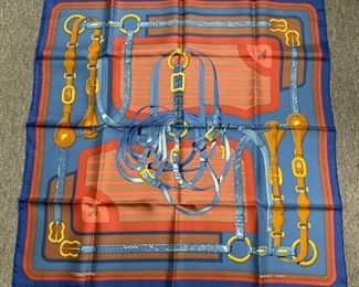 83	Hermes Paris silk scarf marked "Coaching"	Hermes Paris silk scarf marked "Coaching"; 35"square, excellent condition, no visible signs of wear.
