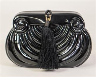 89	Timmy Woods Black Acrylic Bag	Timmy Woods black acrylic clutch with tassel, woven shoulder strap, satin lining, one zippered interior pocket, some wear, 6"H, 9"W, 3 1/2"D
