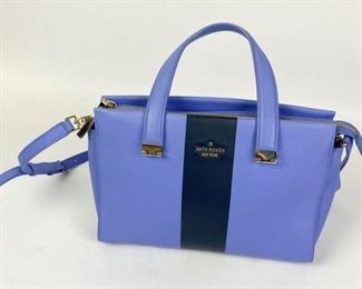 94	Kate Spade Blue Leather Handbag	Kate Spade handbag in periwinkle blue with double handles and adjustable, removable shoulder strap, gold tone hardware, three separate compartments with zipper closure in center, fabric lining, three interior pockets - one zippered, minor marks, good condition, includes dust bag, 8"H, 12"W, 5"D
