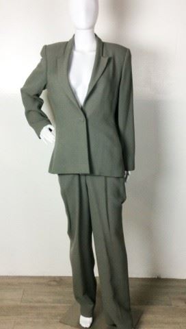 101	Carolina Herrera Wool Sage Pant Suit	Carolina Herrera Sage Pant Suit 100% Wool Size 8 One Button Jacket Front condition - small stain left liner and small hole in pant
