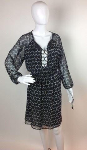 112	Ivanka Trump Dress Black & White NEW w /TAGS	Collectible Fashion - Ivanka Trump black & White Geometric Design Dress - Sheer Illusion Fabric overlay Solid Body Tie Neck - Golden Tie Ends SIZE 8
