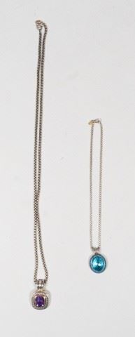 119	2 David Yurman Sterling & Stone Pendants & Chains	David Yurman (American, 20th/21st century). 2 sterling and stone pendants, both with sterling chains. Sterling silver box style chain, with a sterling and topaz pendant, chain with DY label and marked 925 on the clasp, pendant marked DY 925, chain 16"L, pendant 1 1/2"L, 30 grams total including pendant; sterling silver box style chain, with a sterling, 14k and amethyst Cable pendant, chain with DY label and marked 925 on the clasp, pendant with DY logo on reverse and stamped DY 925 585 on the closure, chain 32"L, pendant 1 3/4"L, 70 grams including pendant.
