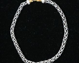 118	David Yurman Sterling, 18k & Diamond Necklace	David Yurman (American, 20th/21st century). Woven sterling silver necklace with 18k gold and pave diamond ends and clasp. Clasp marked 750 DY 925. Necklace 16"L, 94 grams total including stones.
