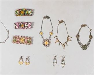 137	Grouping of Victorian Costume Jewelry	Lot includes two pairs of earrings, one marked M. Negroni; three bracelets marked MX, four necklaces, one marking Michael Negroni, one marked Yoni Z, all good condition.
