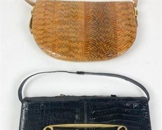 165	Grouping of Vintage Alligator and Snakeskin Bags	Lot includes vintage El Trebol black alligator clutch with gold tone hardware, single handle, snap closures, exterior slip pocket, wo interior compartments, zippered pocket, some peeling of leather, wear and marks consistent with age and use, 5 1/4"H, 12"W, 1"D; vintage Pelletterie C3 brown snakeskin handbag, single handle, gold tone hardware and snap closure, exterior zippered pocket, tan leather interior, two compartments, gold tone compact mirror attached, wear and marks consistent with use, good condition, 8"H, 11 1/2"W, 1 1/4"D.
