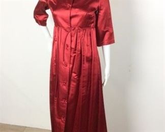 175	Vintage Dynasty Red Coat Dress /Gown	Vintage Dynasty made for Lord & Taylor New York in the British Crown Colony - Hong Kong Oriental Fashioned Red Satin 3/4 length Sleeve Coat Dress /Gown Lucky 7 Knotted Buttons down the Front Size 10
