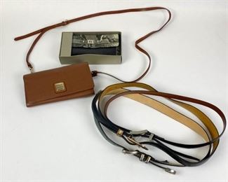 184	Grouping of Leather Belts and Wallets	Lot includes Dooney Bourke brown pebbled leather wallet, new in box, gold tone accents and hardware, detachable adjustable shoulder strap, exterior zippered pocket, snap closure, two center compartments with pockets, one center zippered pocket, some minor marks, good condition, 4 1/2"H, 8"W; Giani Bernini black leather wallet with snakeskin accents, exterior zippered pocket, snap closure, new in box, 4 1/2"H, 7 1/2"W; Brighton green leather Western belt, silver tone hardware, 39"L, 1 1/4"W; Al Beres black leather belt, gold tone and metal buckle and accents, marks from wear, good condition, 30"; Joan and David black belt with silver tone hardware, light wear, good condition, 38"L, 3/4"W
