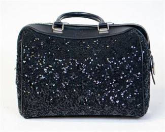 189	Louis Vuitton Black Sequin Speedy Bag	Leather, zippered, single rolled top handle, canvas interior with some minor markings 9"H; 12 1/2"W; 8"D
