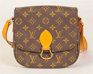 193	Louis Vuitton Messenger Bag	From the 1992 Collection; vintage, LV monogram, brass hardware, flap closure at front, single adjustable shoulder strap, leather trim embellishment, leather lining and single interior pocket, some minor wear; 7 1/2 H; 7 1/2" W; 2 1/4" D
