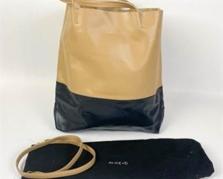 216	Alice D. Leather Milano Tote	Alice D. leather tote in tan and black, double handle, single zippered interior pocket, detachable shoulder strap, like new, includes dust bag, 12 1/2" H X 15" W X 2" D
