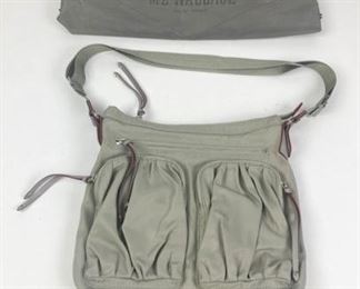 219	MZ Wallace Crossbody Bag	MZ Wallace grey nylon crossbody bag, top zippered closure, leather and silver tone accents, multiple pockets, adjustable nylon shoulder strap clip in zip pouch, includes dust bag, good condition, 9 1/2H, 12 1/2"W, 2"D
