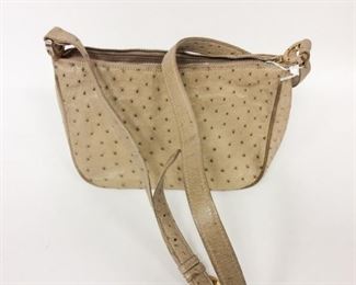 222	LANA of LONDON Ostrich Handbag	LANA of LONDON GENUINE Ostrich Leather Handbag Zipper Closure - Made in Italy has 2 zipper inner pockets ** note ** lip stick / mark -up marks inner lining **
