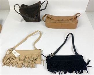 227	Grouping of Focus Paris Handbags	Lot includes black suede fringed handbag with zipper closure and adjustable removable strap, minor wear, good condition, 5"H, 11"W; tan leather fringed handbag with zipper closure and adjustable removable strap, some marks, tags attached, 5"H, 11"W; brown suede handbag with snakeskin accents, zipper closure, tags attached, good condition, 5 1/2"H, 8 1/2"W, 5 1/2"D; tan leather handbag with antique gold tone accents, buckle and fringe detailing, single shoulder strap, exterior zipper pocket, magnetic closure, three interior compartments, two interior pockets, good condition, 7"H, 12"W, 2 1/2"D, includes two logo dust bags

