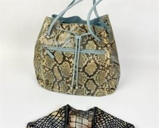229	Grouping of 2 Designer Handbags	Lot includes Lambertson Truex snakeskin drawstring bucket bag, made in Italy, zippered exterior pocket, blue leather interior, zippered interior pocket, minor marks, good condition, 11 1/2"H, 14"W, 8"D; Emily Cho metallic crocodile fold over clutch, double zipper closure, magnetic flaps, zippered interior pocket, minor marks from use, good condition, 7"H, 14"W, 1/2"D
