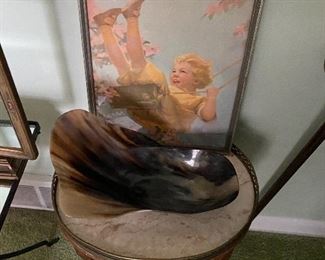 Small marble-top accent table; genuine horn bowl crafted in India.