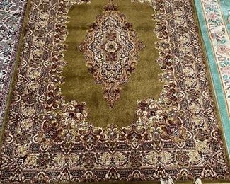 Numerous wool Oriental rugs to include Karachi and Couristan, among others.
