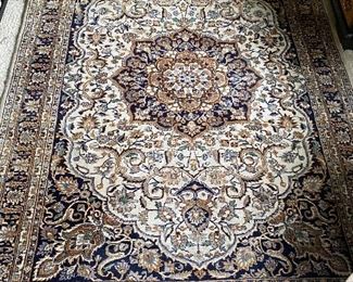 Numerous wool Oriental rugs to include Karachi and Couristan, among others.