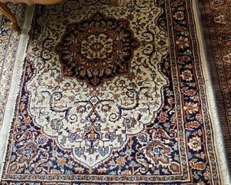 Numerous wool Oriental rugs to include Karachi and Couristan, among others.