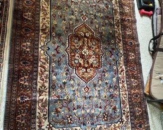 Numerous wool Oriental rugs to include Karachi and Couristan, among others.