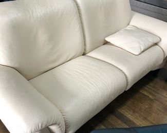 Ekornes Stressless ivory white leather loveseat 70" wide x 32" deep x 35" back height x 18" seat height. $2,400. This photo shows actual color of leather sectional and loveseat